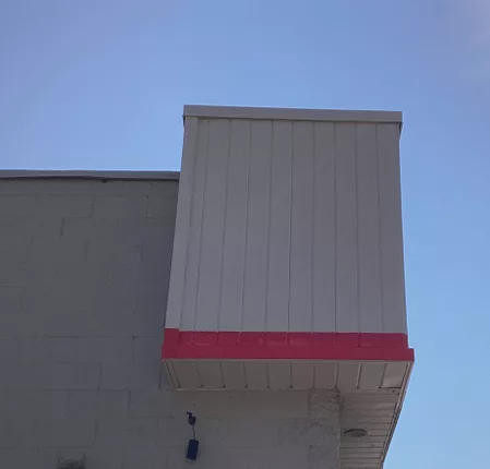 Rebuilt framing, replaced soffit and fascia, painted to match existing design and cleaned up job site