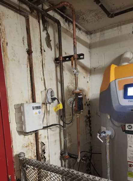 wall damaged by water leaking from water heater